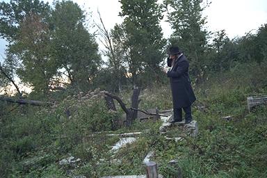 Rabbi at cemetery