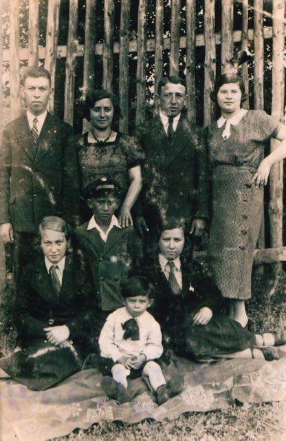 Joseph Weiss with
                        cousins Salomon Weiss and Moishe Frieder and
                        others