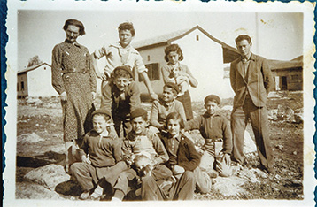Dr. Duker w/ kids, 1930
