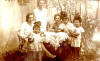 Gutha far left and Vera in garden in Riga